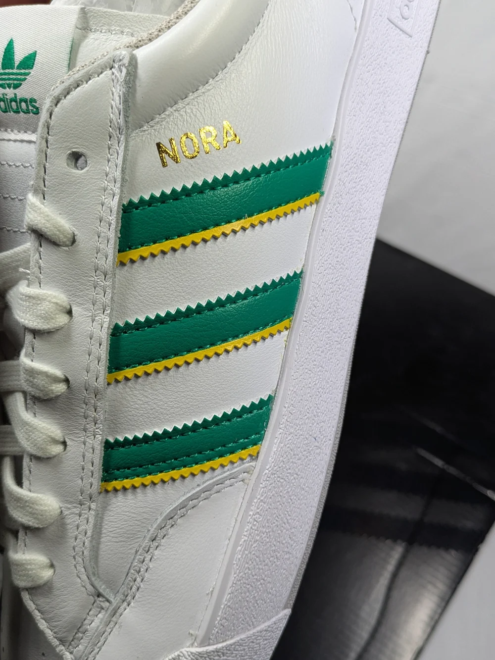adidas Men’s White Nora with Green & Yellow Stripes